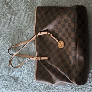 Michael Kors Purse bought new at Macy's hardly used.